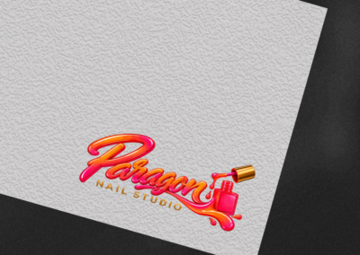 Paragon Nail Studio logo design featuring pink and orange script lettering, gold accents, and a nail polish bottle illustration.